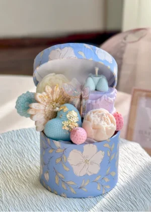 Gift box with eco-friendly soy wax candles in sky blue color, paired with dried flowers